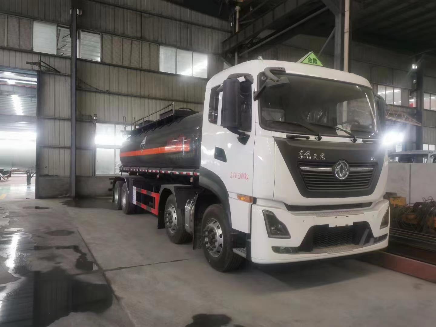 東風天龍前四后八國六平頂腐蝕品罐式運輸車